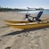 A personal water bike on a sandy beach